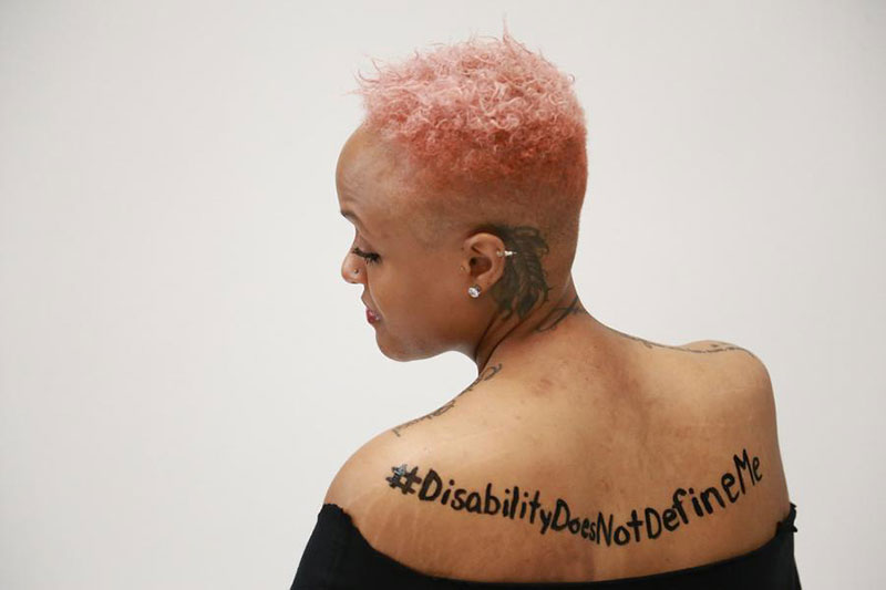 Keisha Greaves with Hashtag Tattoo