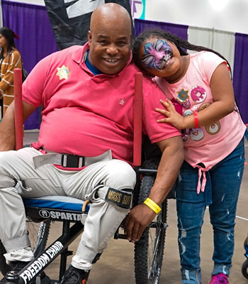 Girl and Dad at Abilities Expo